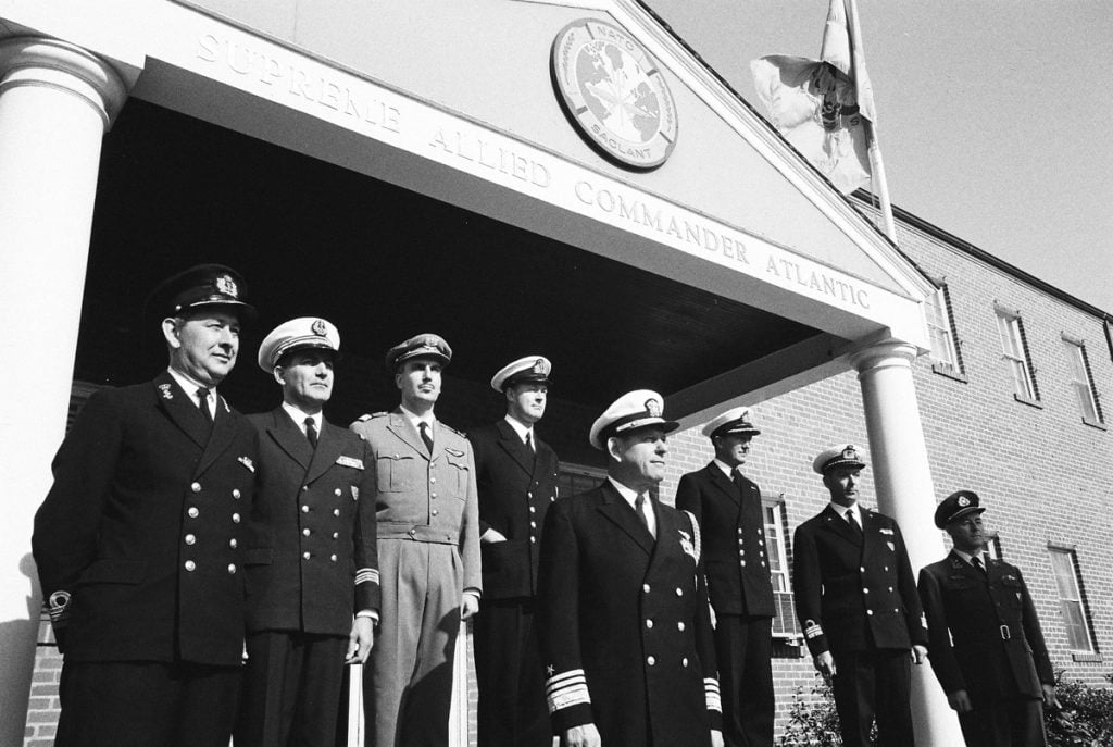 Officers of SACLANT stand in front of their building in November 1964.